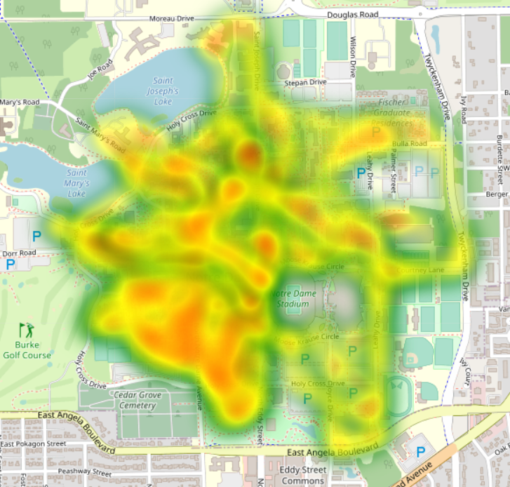 Heat map overlaid on a map of the University of Notre Dame campus, showing a concentration of activity centered around Notre Dame Stadium and extending north towards Saint Mary's and Saint Joseph's Lakes.